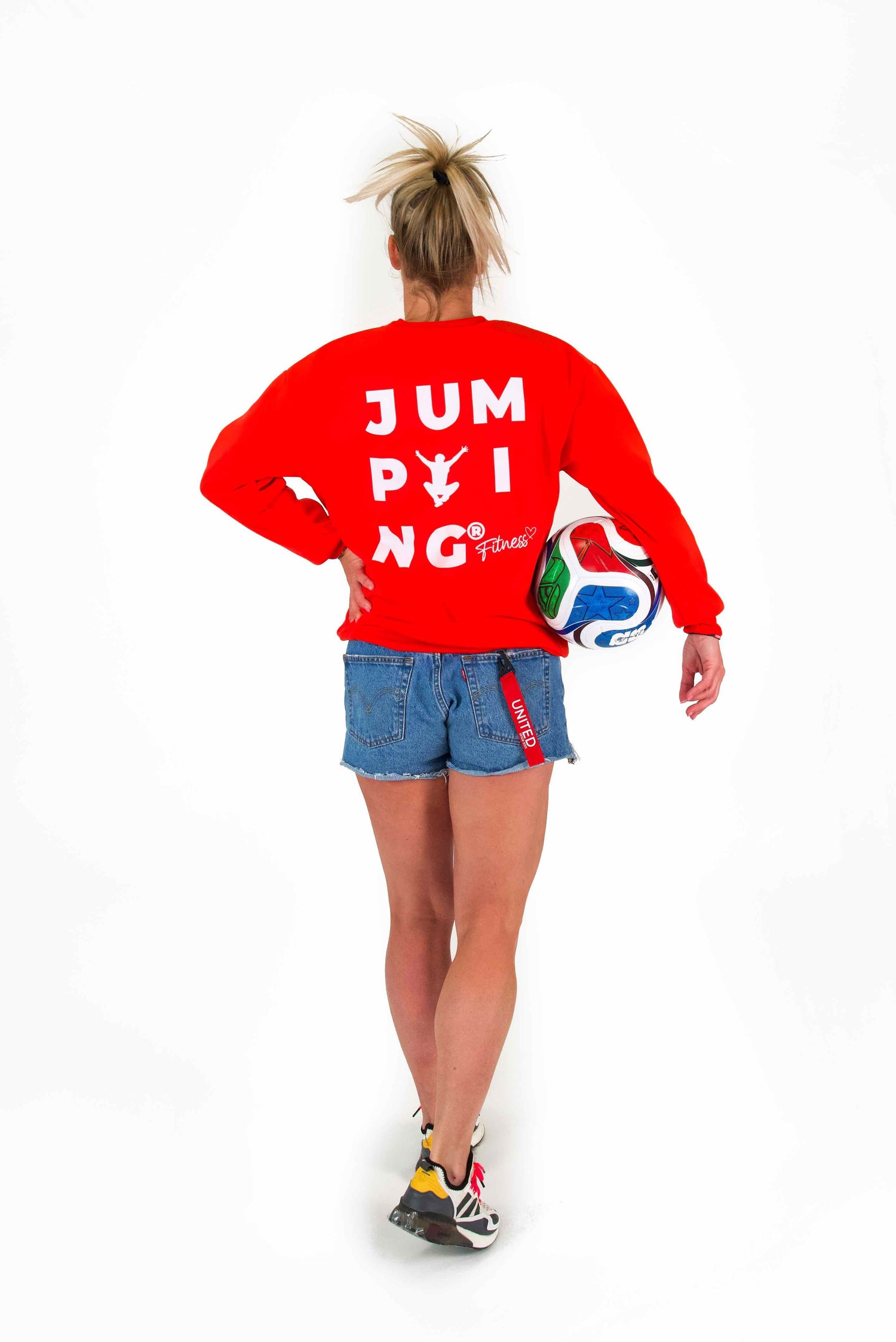 Rotes Sweatshirt mit JUMPING® Grafik und ikonischer Figur