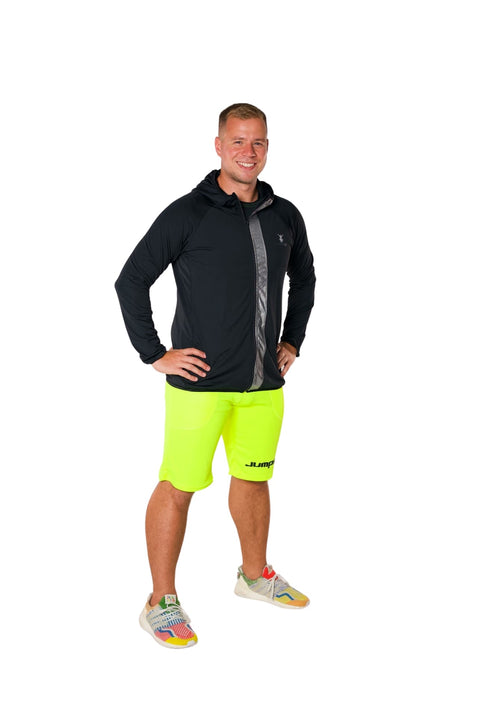 Men's yellow shorts above the knees - premium  from Jumping® Fitness - Just €44! Shop now at Jumping® Fitness
